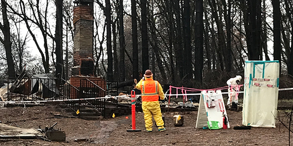 Man at fire site